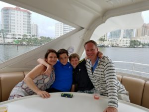 A happy family enjoying their weekend on the yacht