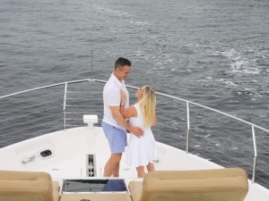 A beautiful couple enjoying their time on the yacht