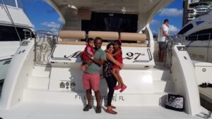 A beautiful family with toddlers on the yacht