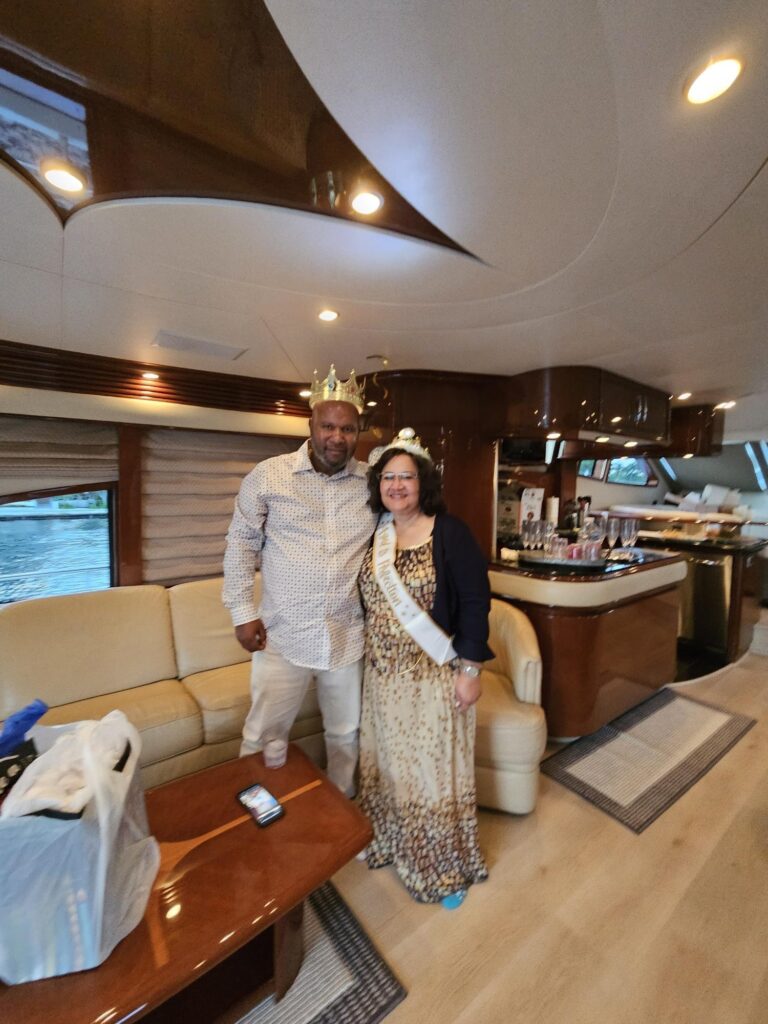 Man and woman celebrate the anniversary aboard our luxury yacht cruise.